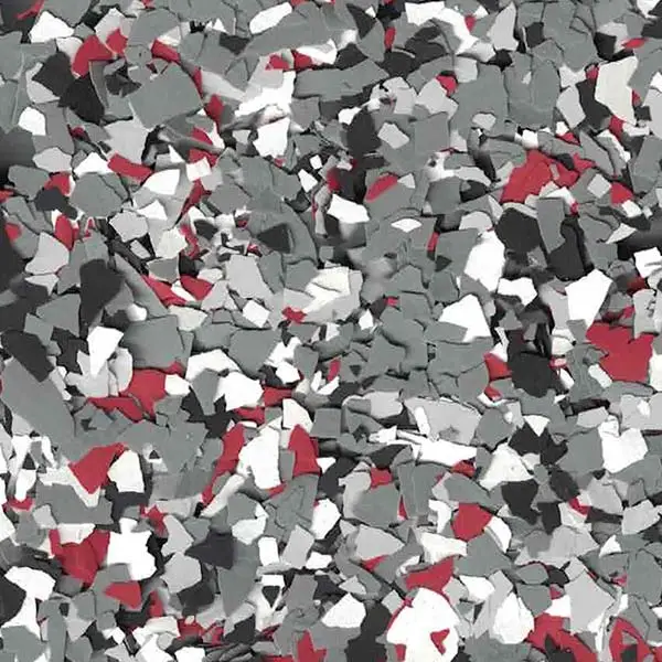 Abstract image featuring a mosaic of randomly scattered gray, red, white, and black shapes, creating a textured blend of colors and patterns.