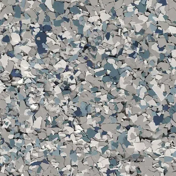 Abstract pattern with various blue, gray, and white shapes, resembling a chaotic mosaic. Textured surface creates a dynamic visual effect.