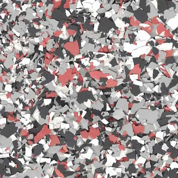 Abstract pattern of multicolored, irregular confetti-like pieces in red, black, gray, and white, creating a dynamic and visually textured surface.