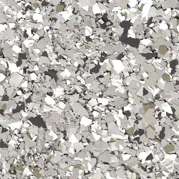 A textured surface of scattered gray and white stones, creating a natural, abstract pattern with varying shades and shapes. No landmarks visible.