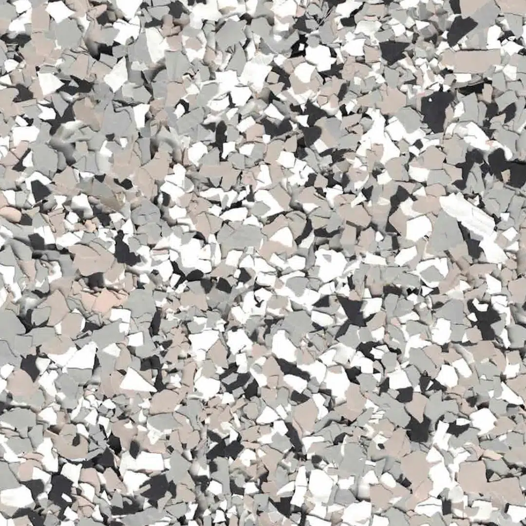 A textured surface with a mix of gray, white, and black scattered shapes creating an abstract, stone-like appearance across the entire image.